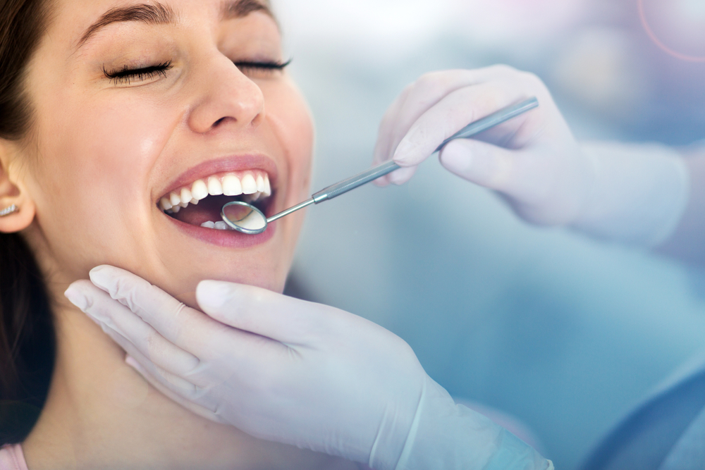Woman,Having,Teeth,Examined,At,Dentists